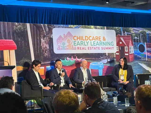 A photo of a panel discussion at the Childcare & Early Learning Real Estate Summit 2025